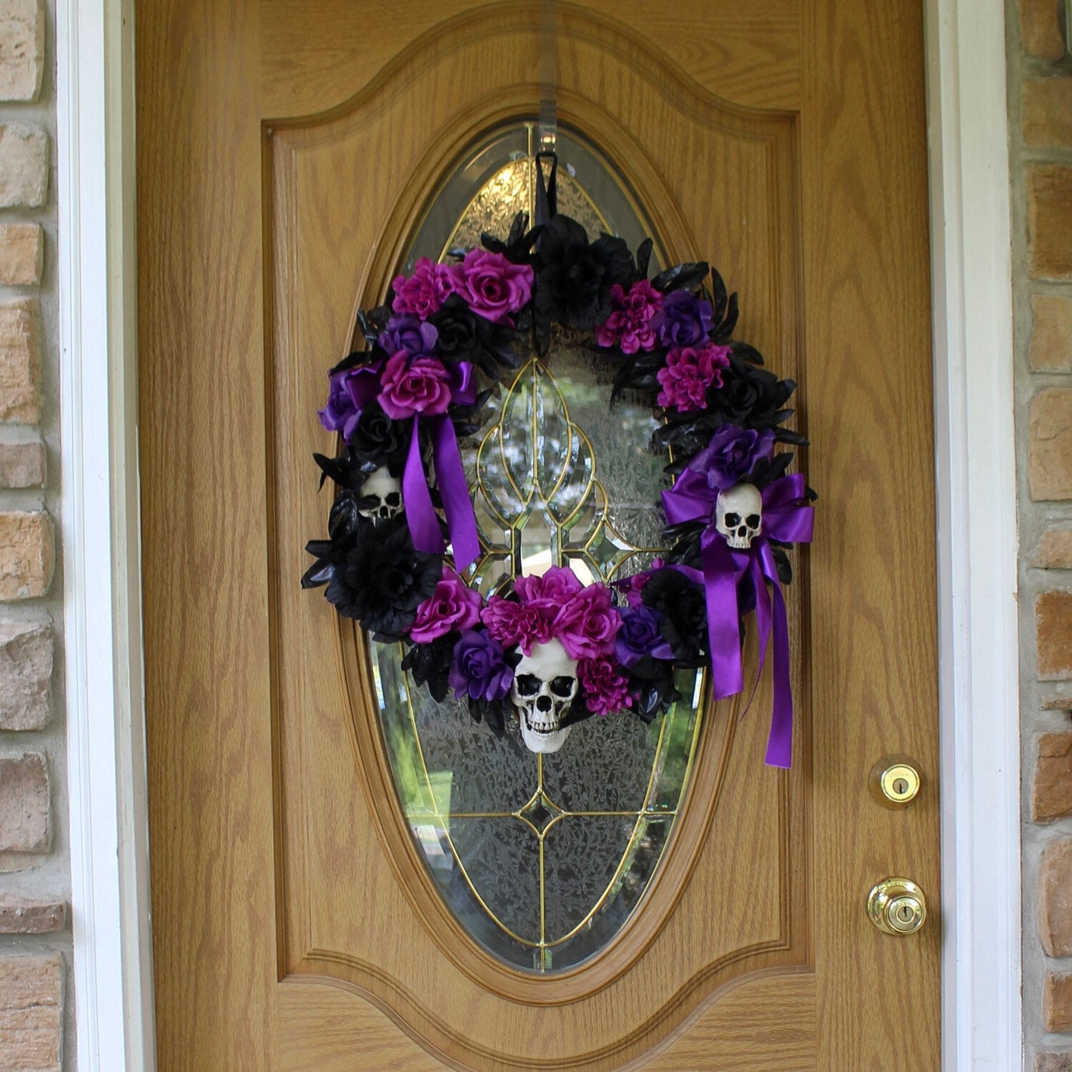 Haunted Hill Farm 1.83-ft. Halloween Wreath with Flowers and Skulls, Indoor/Covered Outdoor Halloween Decoration